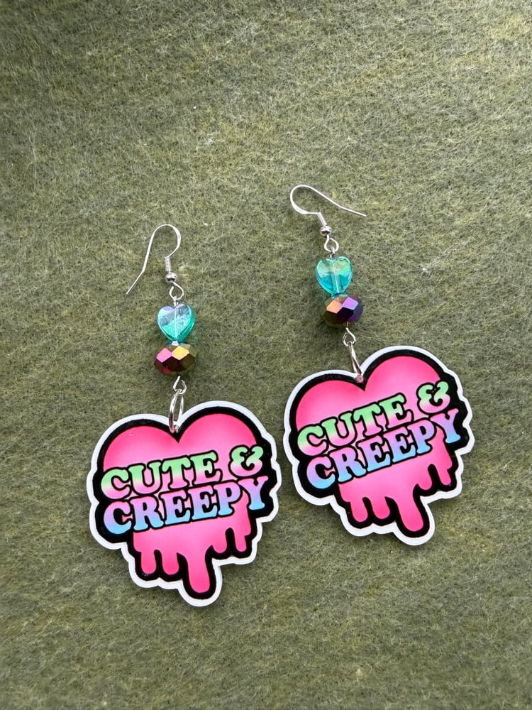 Image of Cute and creepy heart earrings 