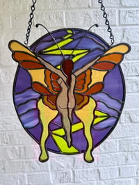 Image 1 of butterfly woman