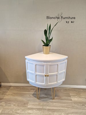 Image of Low Nathan Corner Drinks Cabinet in White on Gold Hairpin legs