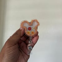 Image 2 of  Magical Puakenikeni Lei Palaka Shaker Badge Reel 