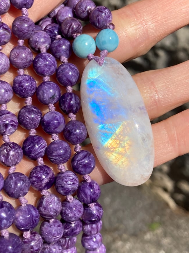 https://assets.bigcartel.com/product_images/c375c2c7-865a-4ffa-91af-65c0bf489ffc/charoite-mala-with-larimar-and-rainbow-moonstone-charoite-108-bead-hand-knotted-japa-mala.jpg?auto=format&fit=max&w=650