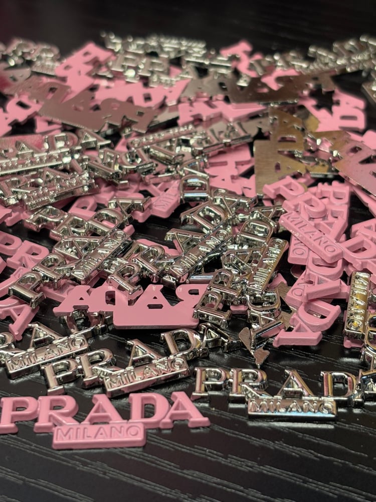 Image of prada sign charms