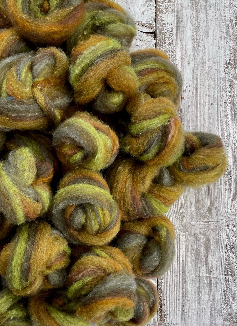 4 oz. • Bitter Herb Sock blend roving: on, 80% Dorset Horn, 10% Kid Mohair, 10% silk