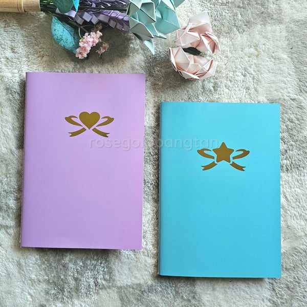 Image of heart x star sticker collection books