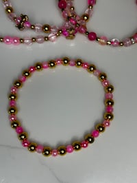 Image 4 of Pink and Gold Pink Parade Tumbler Bracelet Stack