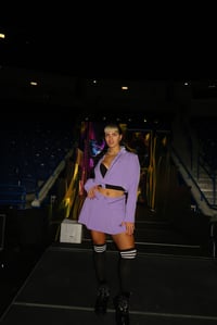 WORN PURPLE SKIRT AND JACKET