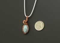 Image 2 of Copper wired Larimar cabochon 