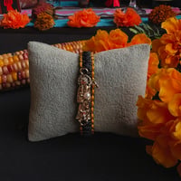 Image 1 of La Negra With Gold Bracelet 