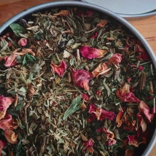 Image of Womens balancing tea