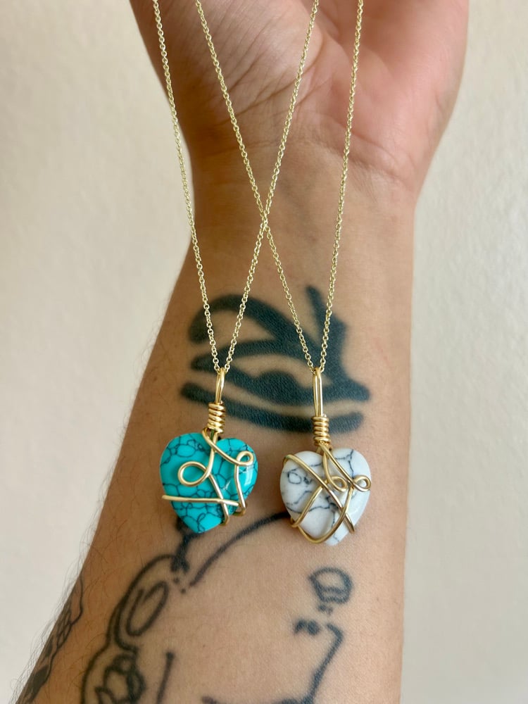 Image of 🩵Wrapped Hearts🤍