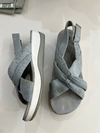 grey cloth foam Clark sandals 