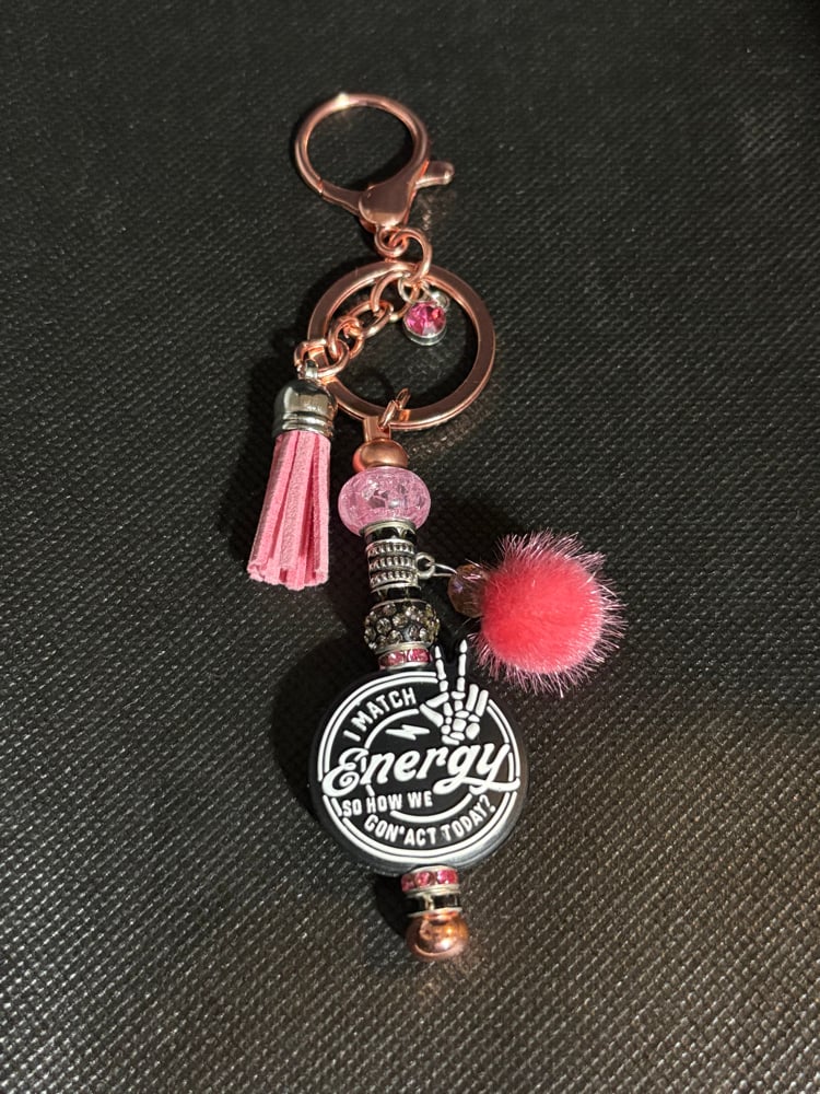 Image of Chic rose gold color bag clip Keychain with Pink and Black Accents