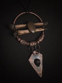 Image 1 of Pyrite & bones 