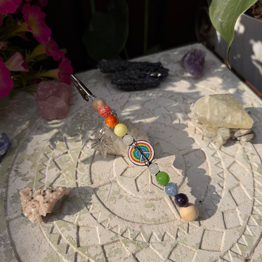 Image of peace & love roach clip