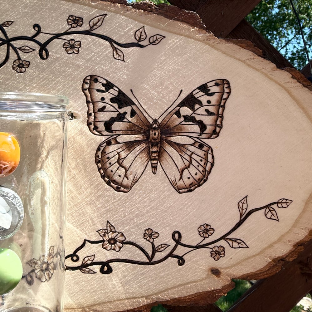 Image of trinity in the crest propagation wood art