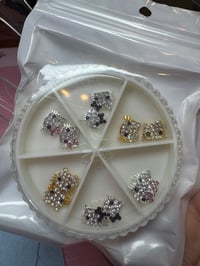 Kitty wheel charm 
