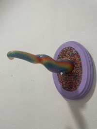 Image 3 of Uv reactive single tentacle in candy rainbow on lilac oval base with sprinkles 