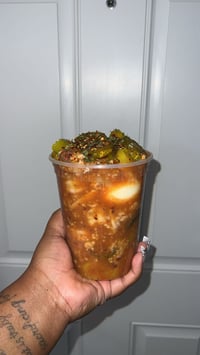 Image 2 of Esha’s Spicy Bowl  - Shrimp, beef sausage, boiled egg, jalapeño, banana peppers, onion and chips 