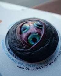 Image 3 of Custom Swappable Phone Grip for smartphones, three iris, reflective pupils, glow in the dark