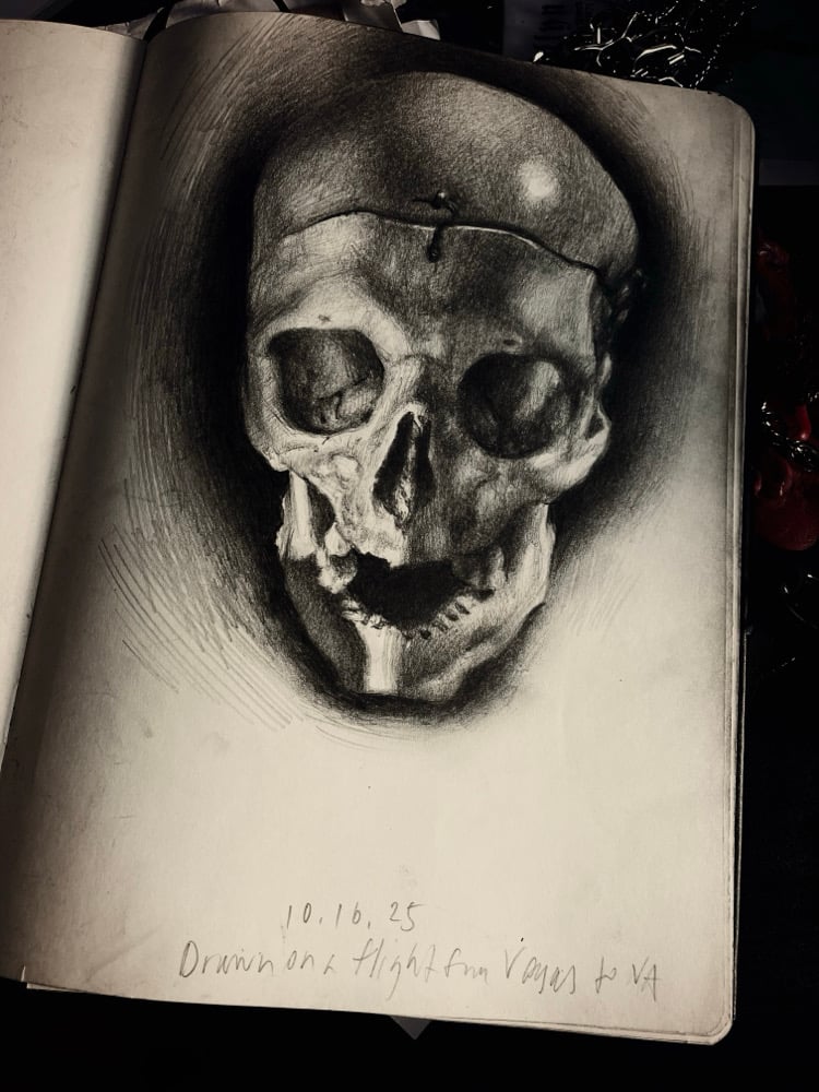 Image of Sketchbook Drawing of a Skull - Drawn at 35,000 Feet, High in the Midnight Sky