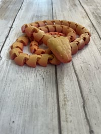 Image 2 of Orange/pink Articulated Snake