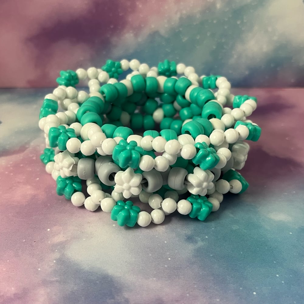 Image of Teal White Flowery Kandi Cuff