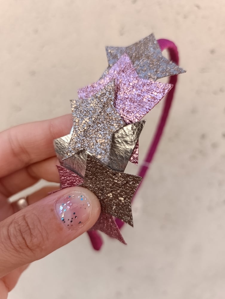 Image of Cerchietto stelle imperfette rosa/oro
