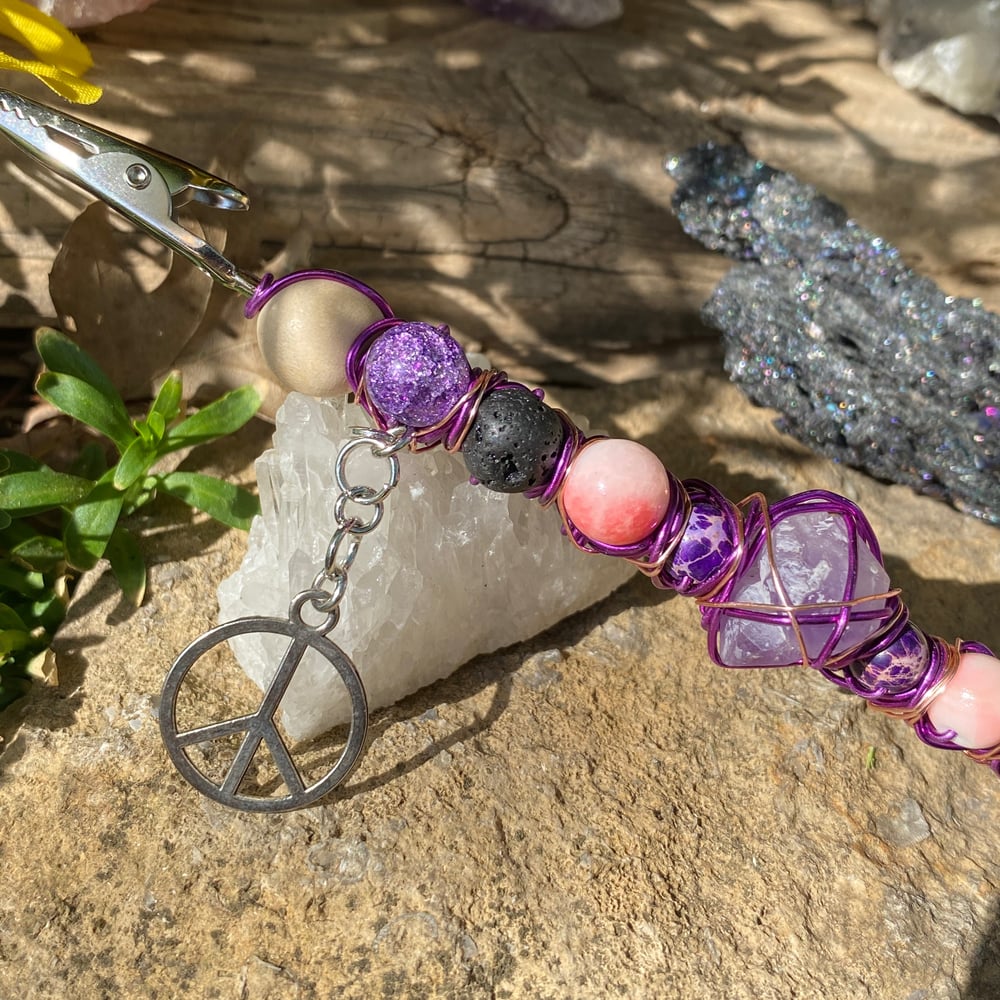 Image of purple magma roach clip
