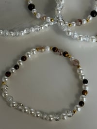 Image 6 of Starlight Shimmer  Cream and Gold  Tumbler Bracelet Stack