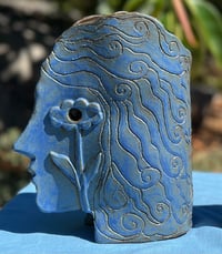 Image 1 of Flo