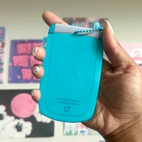 Image 7 of nova 710 flip phone pc holders. 