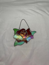 Image 1 of Orange rainbow rose