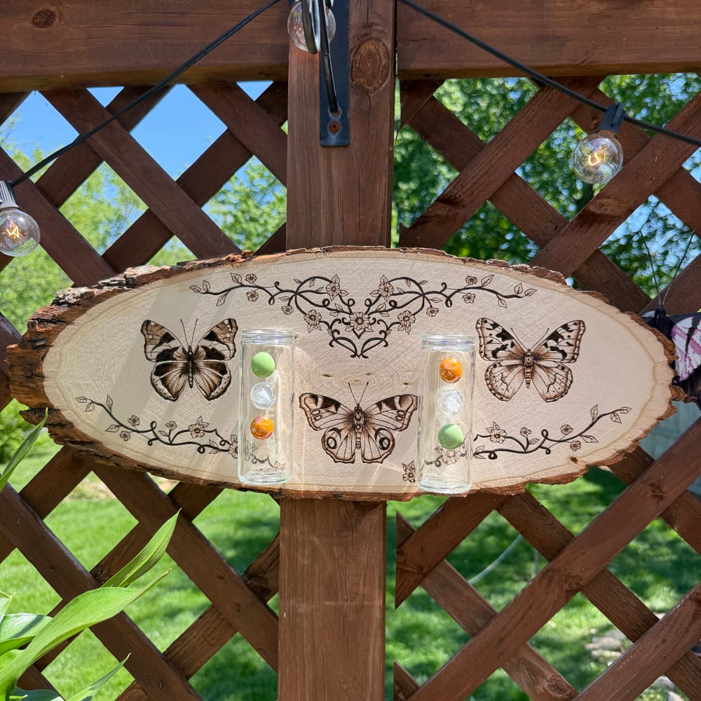 Image of trinity in the crest propagation wood art