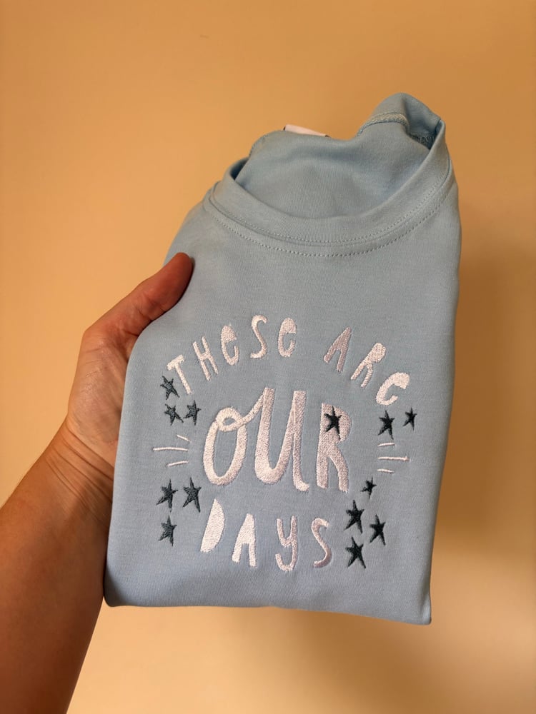 Image of 7-8 baby blue tee