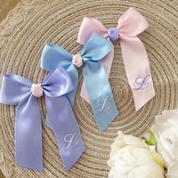 Image 2 of Pastel initial bows 