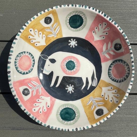 Image of Hand made and decorated ceramic bowl with wild boar