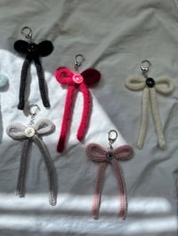 Image 3 of button bow keychains 