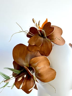 Image of Tan bilateral flower headpiece