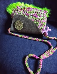 Image 2 of Olive green leather crossbody bag with pink and green crocheted front