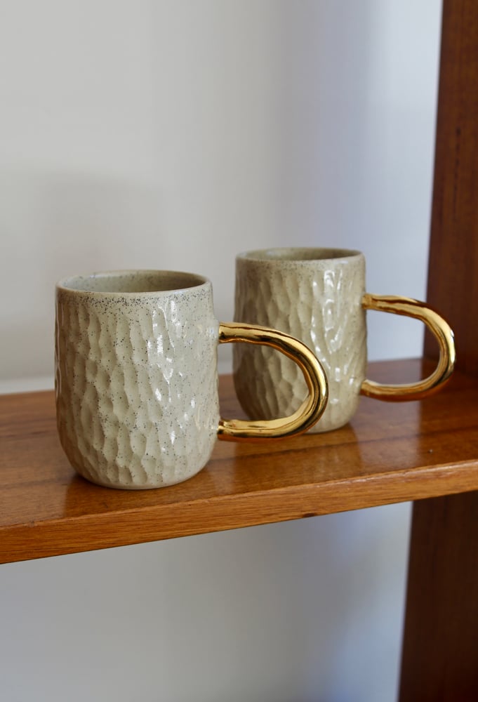 Image of Carved Mugs 