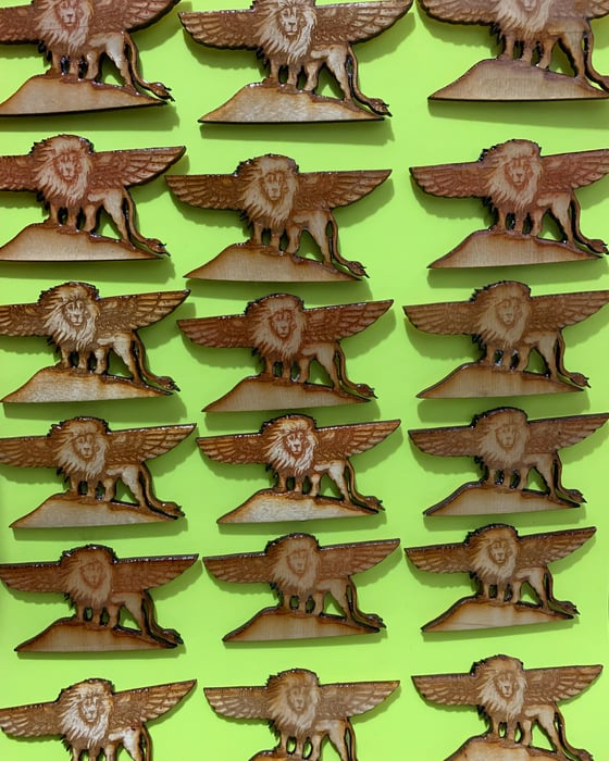Image of Lion wing wood pins 