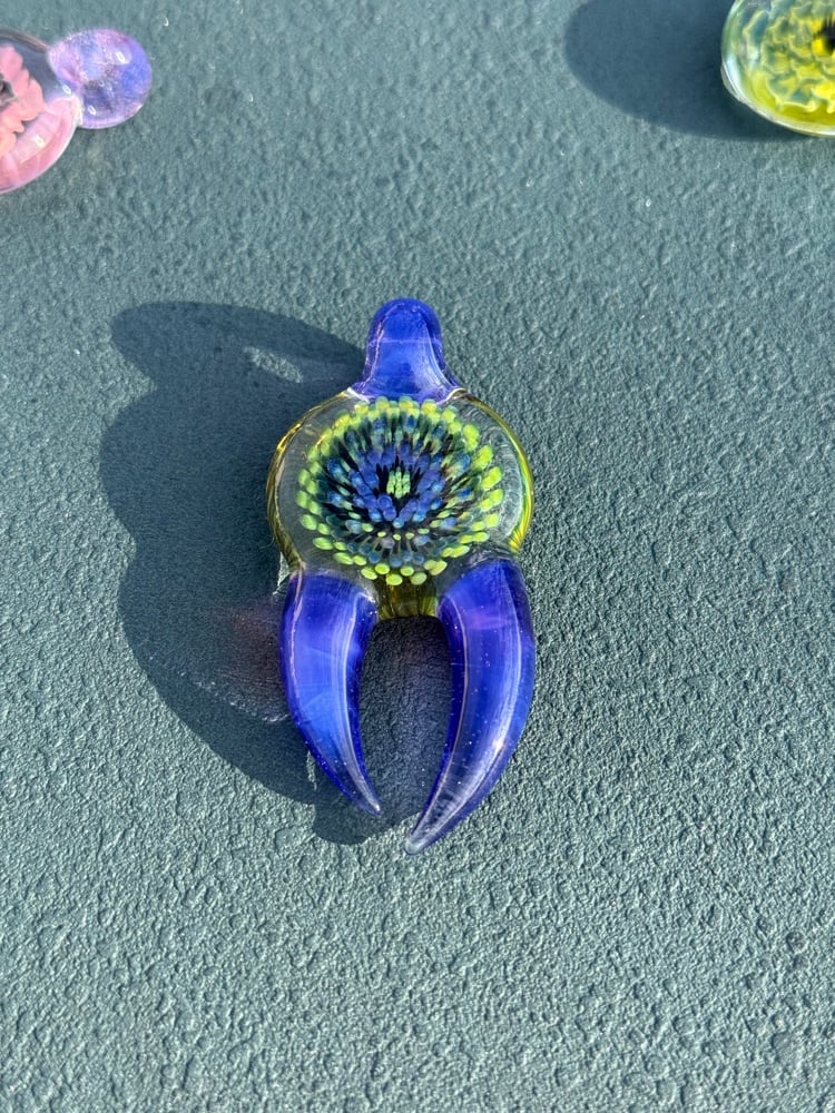 Image of  Green and purple horned pendant