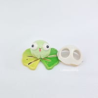 Image 1 of Silly smile Frog on lily pad with ghost mask ceramic figurine