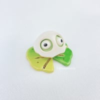 Image 4 of Silly smile Frog on lily pad with ghost mask ceramic figurine