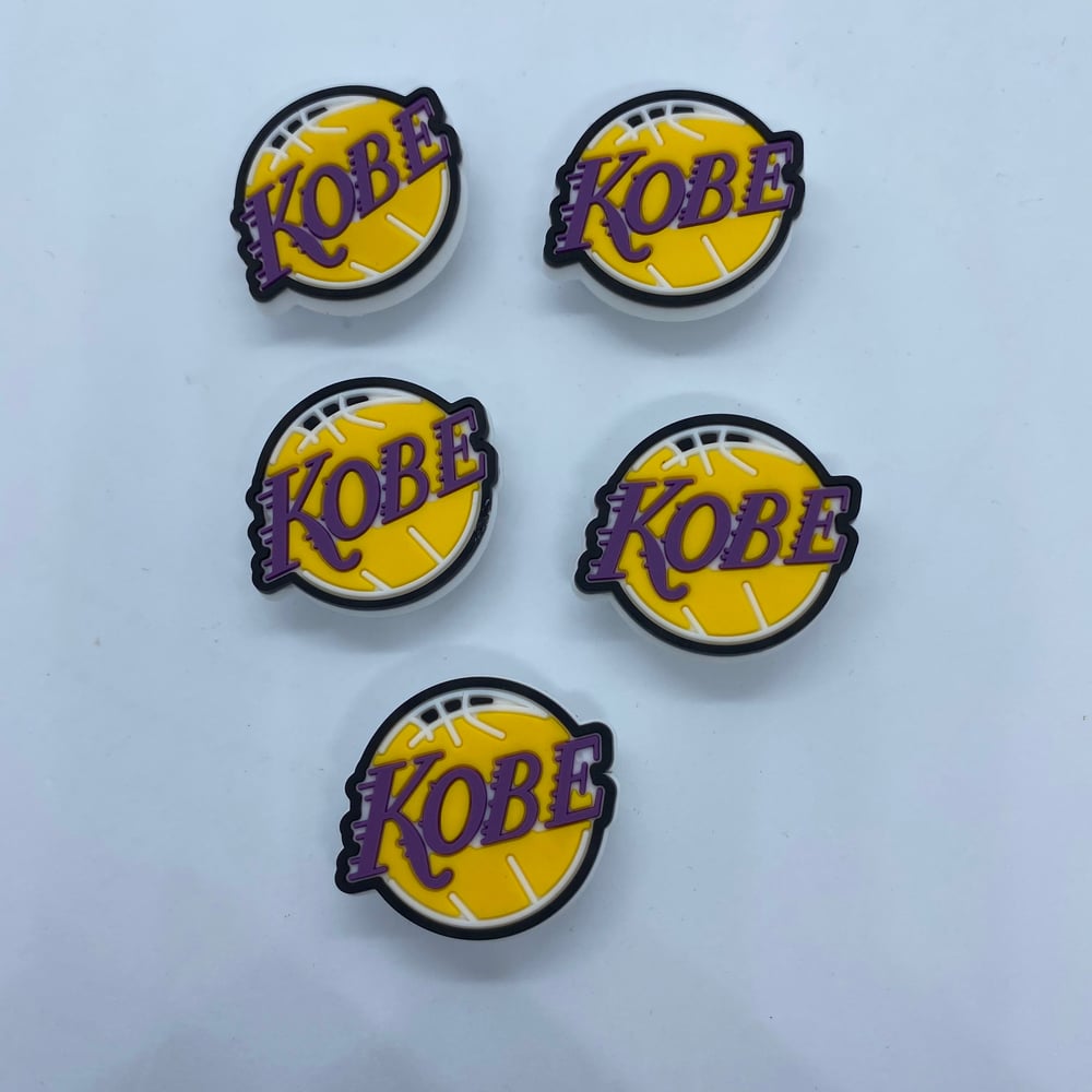 Image of Purple and Yellow K Charm