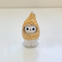 Image 1 of White cat with chicken drumstick ceramic figurine