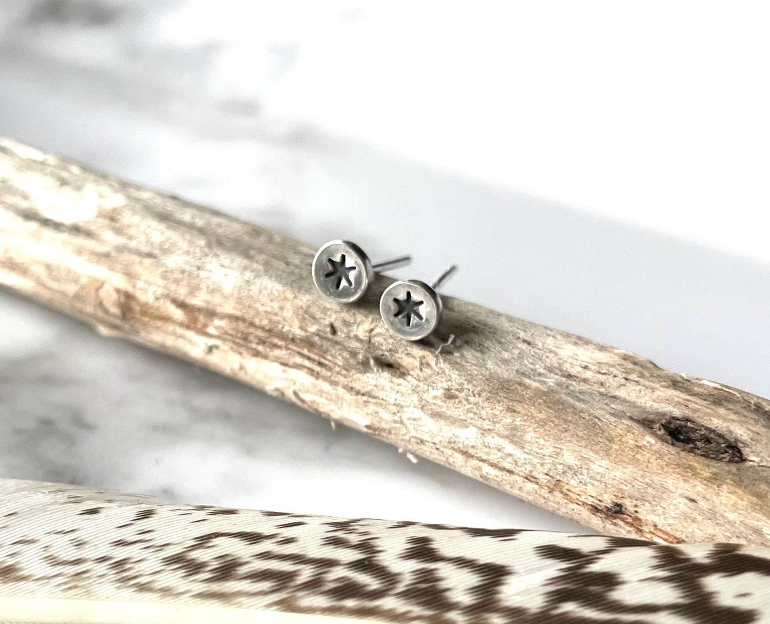 Image of Handmade sterling silver stamped star stud earrings. Tiny star studs 925 silver.