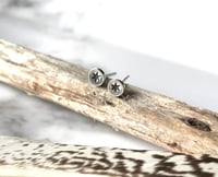 Image 1 of Handmade sterling silver stamped star stud earrings. Tiny star studs 925 silver.