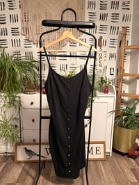 Image 1 of NWT black ribbed snap dress 