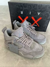 Jordan 4 Retro Kaws